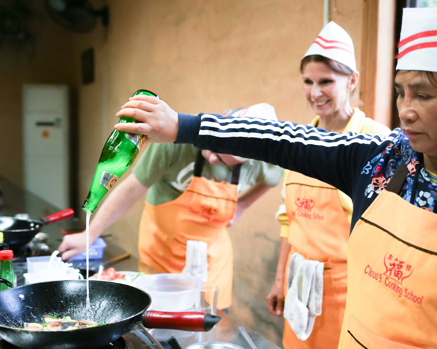 Making beer fish during cooking class