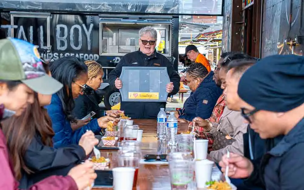 Group eating with guide